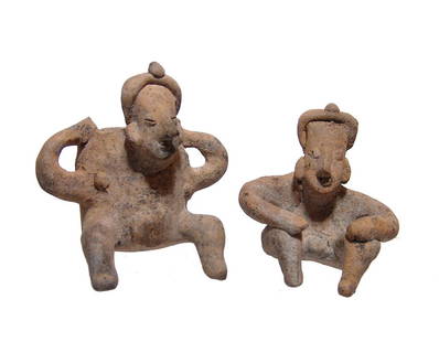 A nice Colima seated male and female pair: A nice Colima seated pair, West Mexico, c. 100 BC - AD 200, the first in the form of a woman carrying a large vessel, H: 3 3/4 in (9.5 cm), and the second in the form of a seated male with hands on