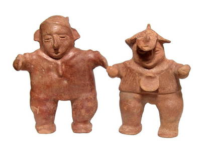 A nice pair of large Colima dancers: A nice pair of large Colima dancers, West Mexico, c. 100 BC - AD 200, the first wearing armor and a mask pulled up to reveal his face, H: 9 in (22.8 cm), the second wearing a necklace with long pendan