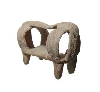 A nice Colima ceramic canopied bed: A nice Colima ceramic canopied bed, West Mexico, 100 BC - AD 250, standing on four tapered legs, the covering rounded on side and flat on ends, a single strap over the top. The bed itself is