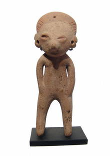 A nice Chinesco standing female figure: A nice Chinesco standing female figure, Mexico, c. 500 - 100 BC, a rare early type, the rounded head with domed headdress, the eyes slants and wearing ear spools; her feet bifurcated. H: 5 1/2 in (14