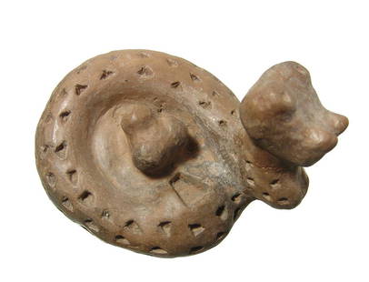 Tairona ceramic votive in the form of a coiled serpent: A nice Tairona ceramic votive in the form of a coiled serpent, Colombia, c. AD 1000 - 1500, the head and scales well-modeled, the serpent has coiled itself around a small animal whose head protrudes