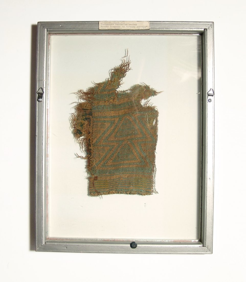 A lovely green and yellow textile poncho fragment (1 of 3)