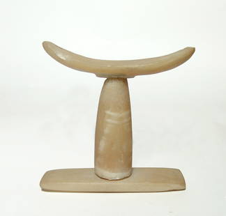 Egyptian alabaster headrest, 1st Intermediate Period: A choice Egyptian alabaster headrest, 1st Intermediate Period, c. 2150 - 1990 BC, fashioned in three pieces, the curved headrest atop a support pillar set into a rectangular base. 6 1/2 in x 7 in