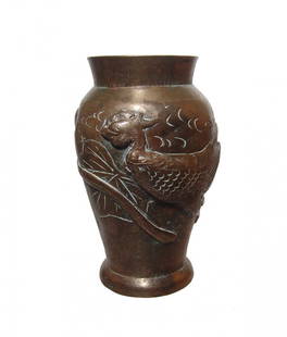 Attractive Chinese decorative brass jar, 19th Century: An attractive Chinese decorative brass jar, 19th Century, with flared foot, the body adorned a feline-headed bird with long tail feathers, all in relief, an incised leaf behind and incised accents.