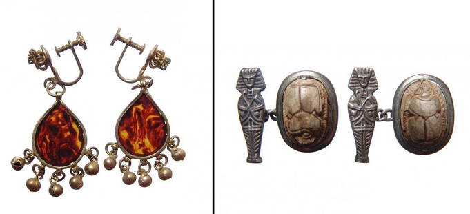 Pair of ancient themed scarab cufflinks and earrings: A pair of ancient themed scarab cufflinks and gold earrings. Lot includes a pair of scarab cufflinks, c. 1920’s - 1940’s, with modern scarabs in a nice silver setting with a mummy case dangle, eac