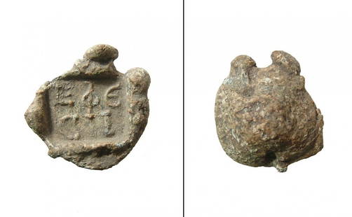 A choice Roman administrative bulla from Ephesus: A choice Roman administrative bulla from the ancient city of Ephesus, c. 2nd - 3rd Century AD, of lead with the Greek letters E Φ E – C I in two lines within a square. A hole runs through the