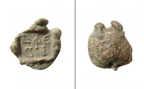 A choice Roman administrative bulla from Ephesus: A choice Roman administrative bulla from the ancient city of Ephesus, c. 2nd - 3rd Century AD, of lead with the Greek letters E Φ E – C I in two lines within a square. A hole runs through the s