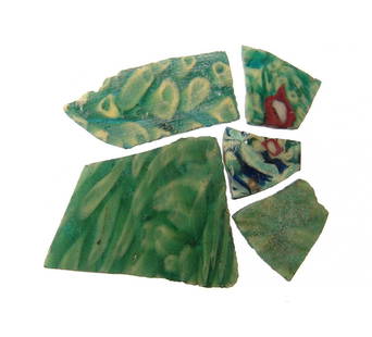 Group of 5 Romano-Egyptian mosaic glass fragments: A lovely group of 5 Romano-Egyptian mosaic green glass fragments, 1st Century BC - 1st Century AD, two larger fragments from a shallow bowl and the others from tiles or inlays. Each with floral