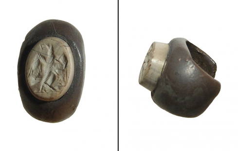 A Roman silver ring with intaglio: A Roman silver ring with intaglio, 1st - 2nd Century AD, the ring heavy with wide, rounded shoulders and attractive grey tone, the sardonyx oval intaglio depicting an eagle in nice style. Ring