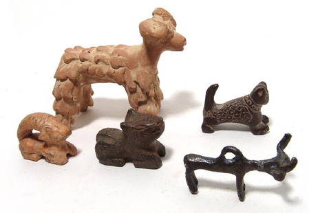 A group of modern animal figures in ancient-style: A group of modern animal figures in ancient-style. All of modern manufacture, the lot includes a ceramic figure of a ram, with fluffy coat and curled horns, a bronze figure of a ram with suspension