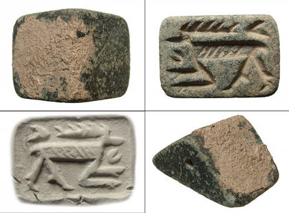A large Mesopotamian steatite stamp seal: A large steatite stamp seal, Southern Mesopotamia, c. 3rd Millennium BC, of gables serpentine with horizontal drill for suspension. On base, a deeply carved horned antelope amidst floral elements. 47