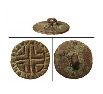 A choice Marlik bronze stamp seal: A choice Marlik bronze stamp seal, c. 1200 - 800 BC, with circular disk with welded loop handle, the base with incised hatched around a central angled cross. Dia: 14 mm. Beautifully patinated. Ex