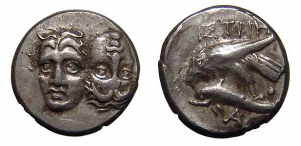 Moesia. Istrus, AR Drachm. Sea Eagle & Dolphin. VF: Moesia. Istrus, c.400 – 350 BC. AR Drachm. 6.05g. Two male heads facing, the rt. inverted. / ΙΣTPIH, Sea eagle flying lt., attacking a dolphin, pellet between, A below. AMNG I/1, p. 161. 