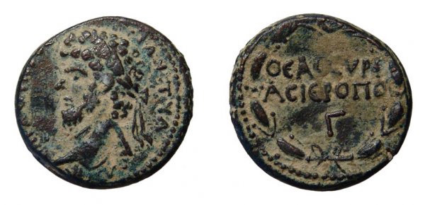 Lucius Verus, AE22. Hierapolis, Syria. Wreath. VF: Roman Empire. Lucius Verus, AD 161 - 169. Æ 22. 10.54g. Hieropolis, Syria. His laureate head lt. / ΘEAC-CYPIAC-IEPOΠO-Γ, within a laurel-wreath. BMC 32v. VF.