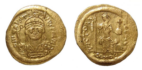 Byzantine Empire. Justin I, Gold Solidus. EF: Byzantine Empire. Justin I, AD 518 – 527. Gold Solidus. Constantinople. 4.45g. DN IVSTINVS PP AVG, his helmeted and cuirassed bust facing, holding Victory on globe and a shield emblazoned with a hor