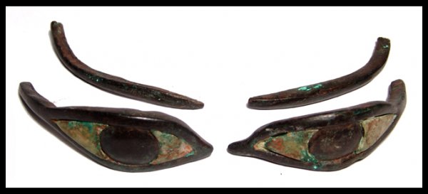 Egyptian bronze inlaid eyes from a sarcophagus: A set of bronze inlaid eyes from a sarcophagus, 25th - 26th Dynasty, 714 - 525 BC. Cast in heavy bronze with nice patination, the inlay consisting of white limestone, the pupils also bronze and part o