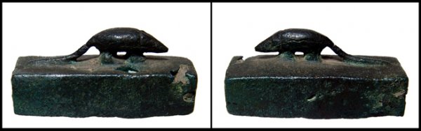 Egyptian bronze mummy box for a shrew: A nice bronze mummy box for a shrew, Late Period, c.664 - 343 BC, with nicely modeled image of the animal on the top. The rectangular box is hollow inside and sealed on one side. Intact with a few cas