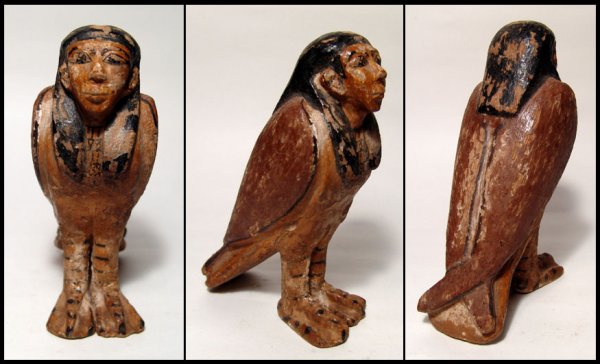 Late Period Egypt. Choice polychrome wood ba-bird: A choice polychrome wood ba-bird, Late Period, c.664 - 343 BC, with nicely carved features and well preserved paint. The face is very realistically rendered with, black wig and cosmetic details; the b