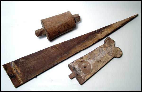 Lot of 3 Egyptian wood items: A lot of 3 wooden items. The first is a plumed headdress with solar disc from a Ptah-Sokar-Osiris figure, Late Period, c.664 - 30 BC. H: 6 ½" (16.4 cm). The second piece is a middle section from a Mi