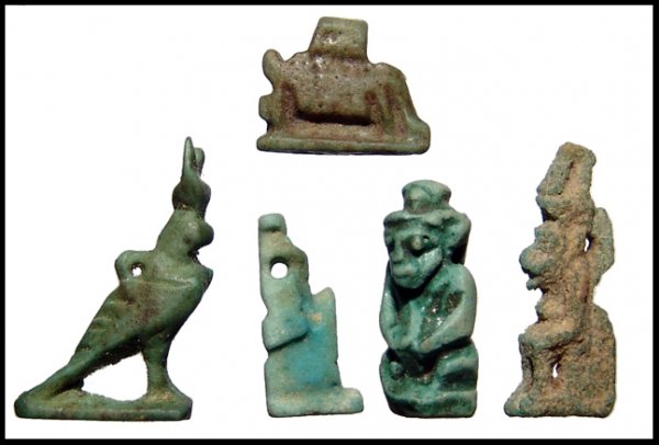Late Period, nice group of 5 faience amulets: A nice group of 5 faience amulets, Late Period, c.664 - 30 BC, which include a Horus falcon wearing disc and plumes, Isis seated suckling the infant Horus, Sekhmet seated wearing double crown, Pataiko