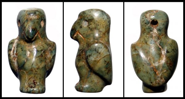 Tairona, Colombia. Green stone eagle pendant: A green stone eagle pendant, Tairona Culture, Colombia, AD 200 - 700. An attractive and nicely carved piece with great style and good yellow-green color. Drilled at the back of the head and at the fee