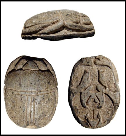 Large scarab with vulture and winged Kheper: Ancient Egypt. A large steatite scarab with finely carved vulture and winged Kheper, New Kingdom, c. 1570 - 1075 BC. Nicely carved body with feathered legs and detailed head. On base, a very nicely ca