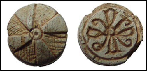 Attractive New Kingdom steatite button seal: Ancient Egypt. An attractive steatite button seal, New Kingdom, c.1570 - 1075 BC, with rosettes on back and front. Diam: 11mm. Some minor chips. Ex coll. Albert F. Pagnon, Luxor, acquired in the 1860'
