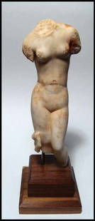 A choice Roman marble figure of Aphrodite: A choice marble figure of Aphrodite, Roman, c.1st Ð 2nd Century AD, with nice carved body. Some losses and repaired at waist, but a nice piece with some original polish. H: 8.5 (19.3 cm). Mounted on