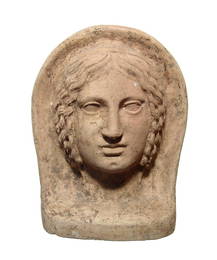 A wonderful Etruscan terracotta votive head of a woman