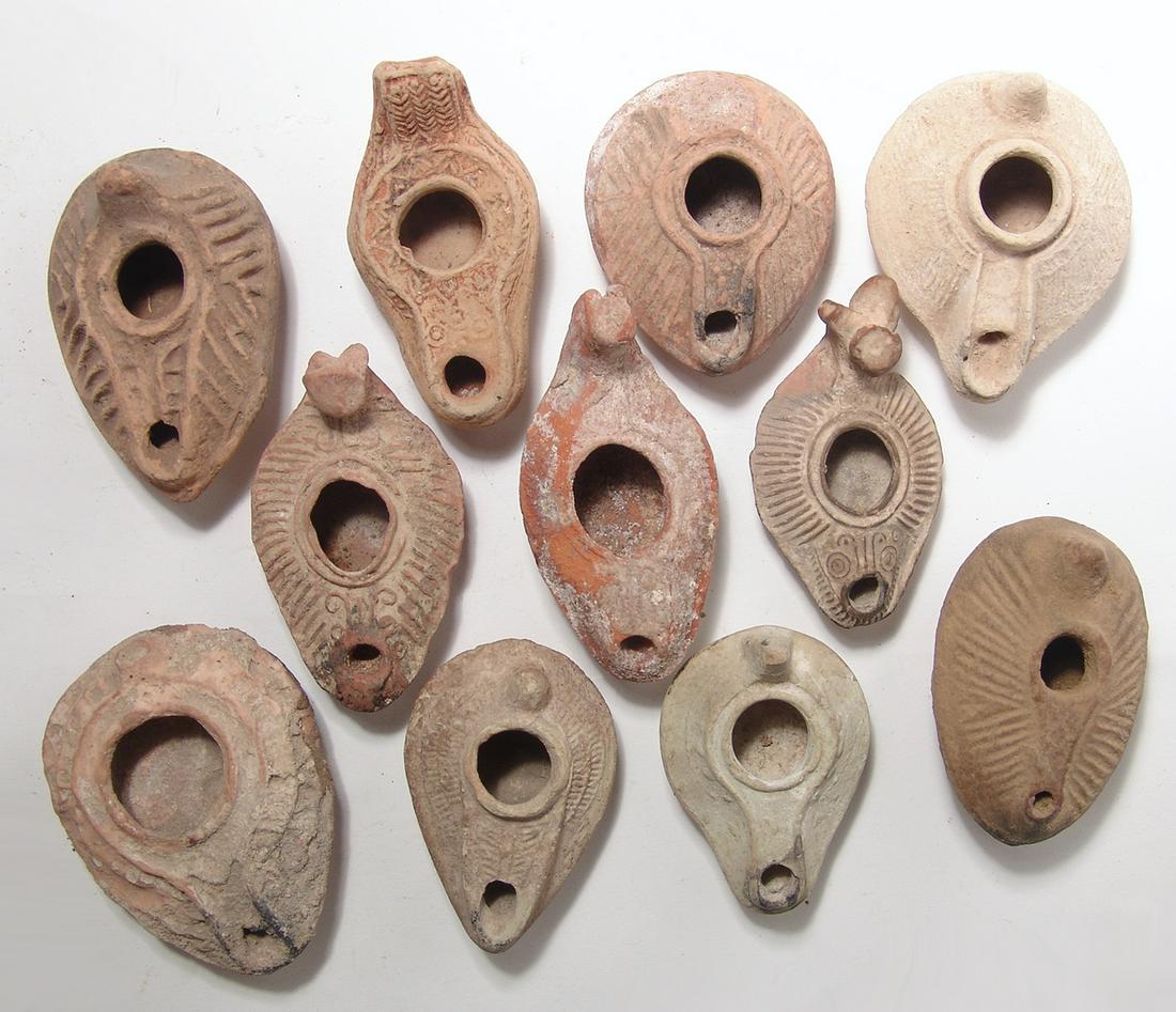 A large group of 11 Byzantine/Islamic ceramic lamps (1 of 2)