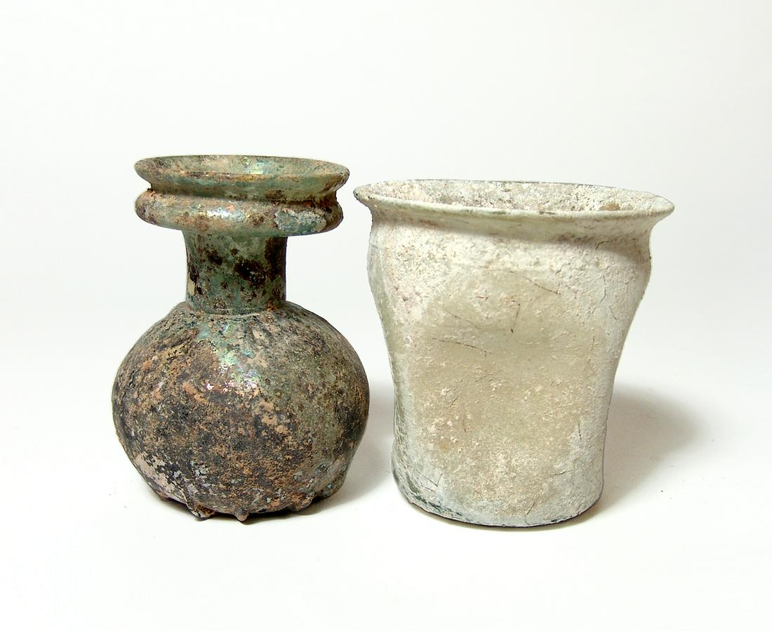 A Roman glass sprinkler bottle and an indented cup (1 of 3)