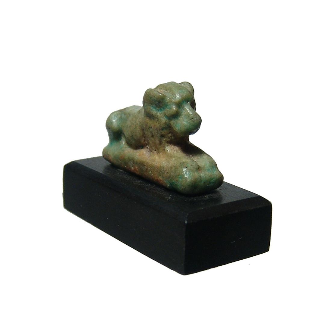 Egyptian faience glazed amulet of a recumbent lion (1 of 3)