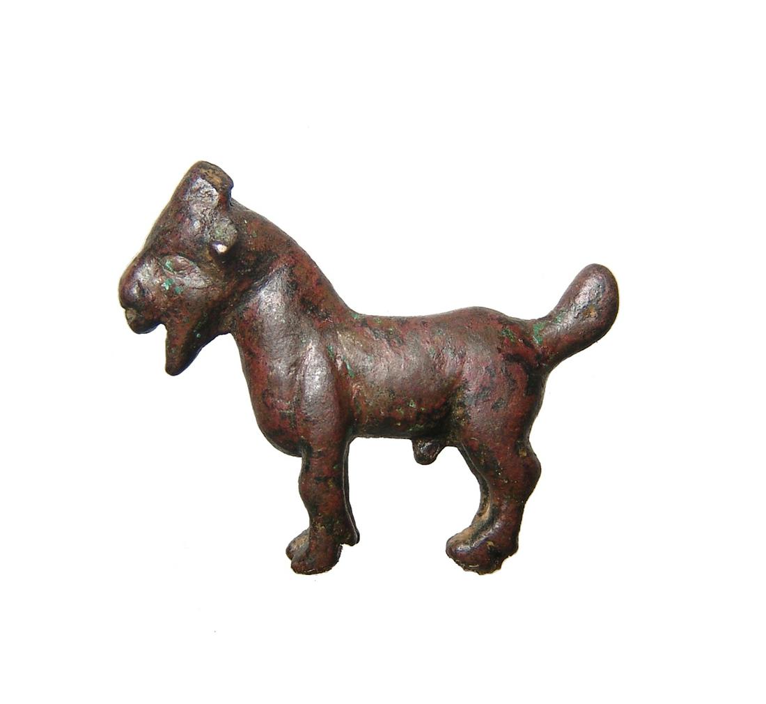 A Near Eastern bronze figure of a goat (1 of 2)