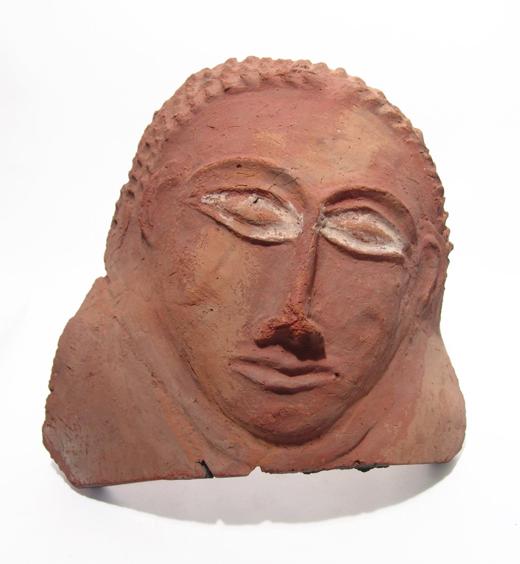A large Canaanite terracotta funerary mask (1 of 3)