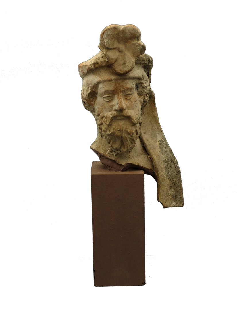 A Greek terracotta head of a bearded man (1 of 4)