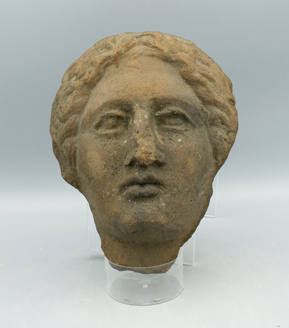 A nice Etruscan terracotta head of a woman (1 of 4)
