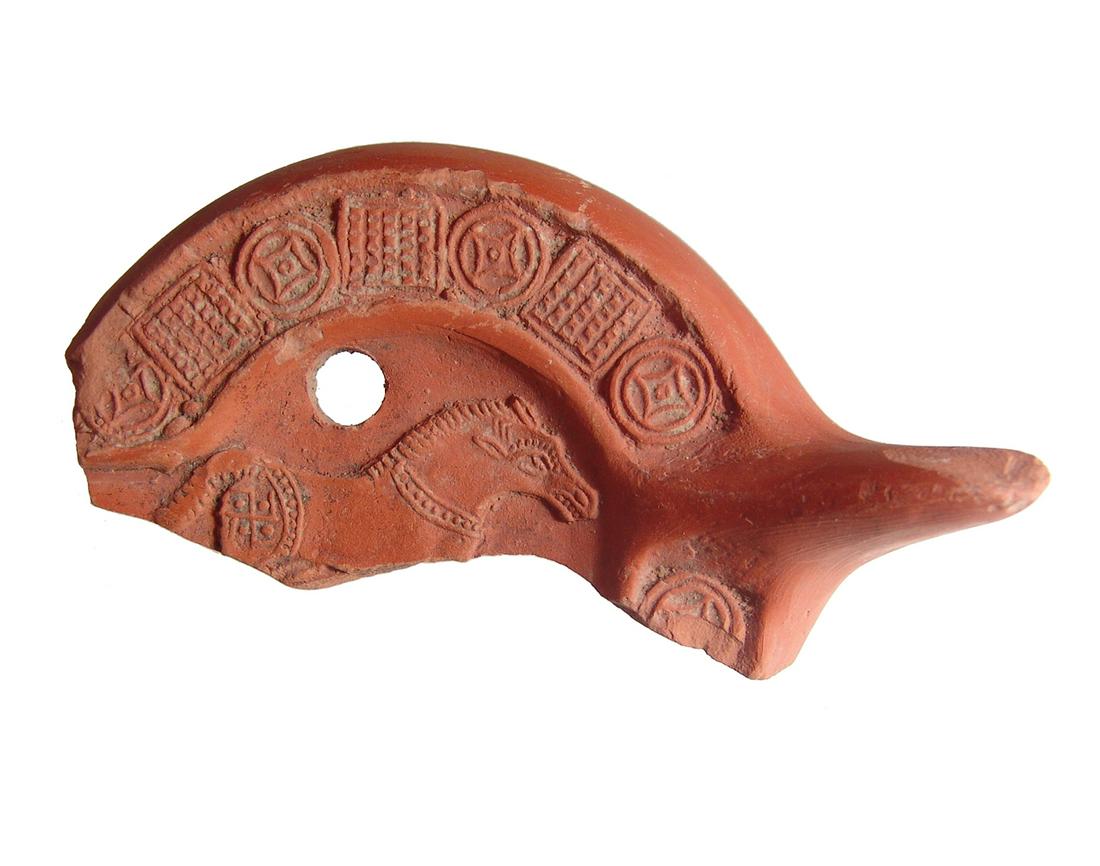 A nice Roman red-ware fragment of a lamp (1 of 2)