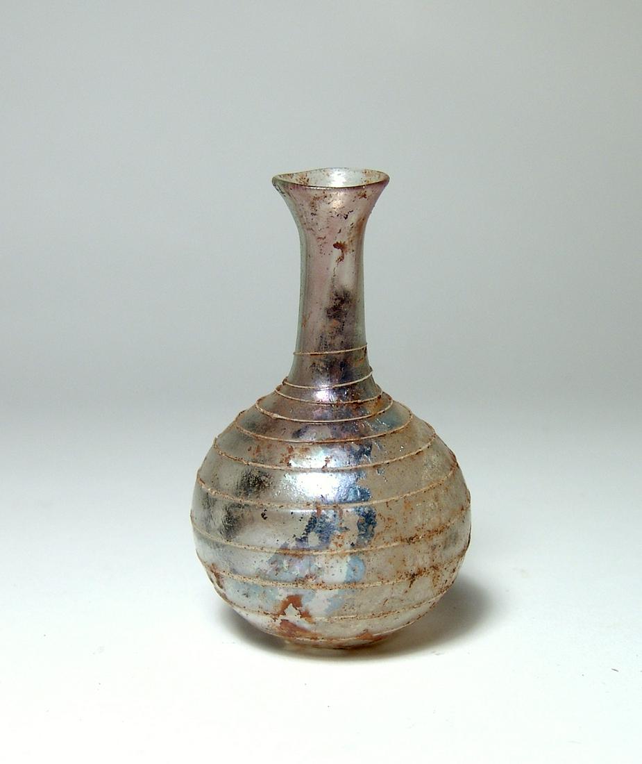 A nice Roman glass spiral bottle (1 of 3)