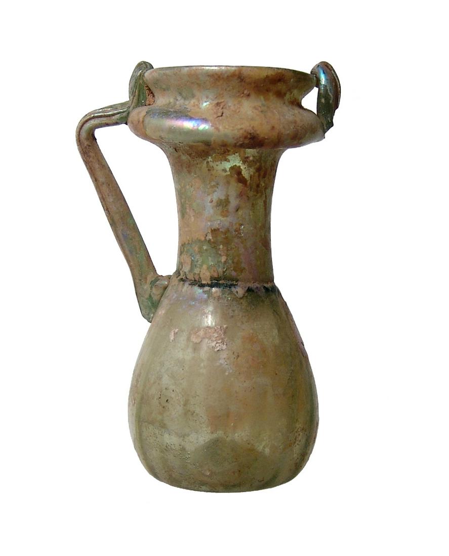 A late Roman pale green glass bottle (1 of 4)