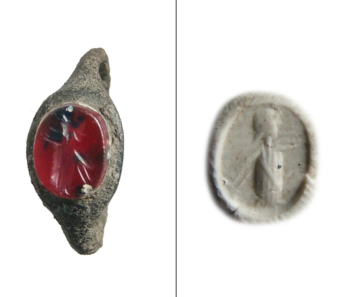 A Roman bronze ring with carnelian ring stone (1 of 2)
