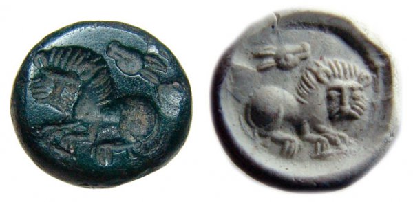 Green bloodstone Sasanian seal with a lion: A deep green bloodstone Sasanian seal with a facing lion, Iran, 5th – 6th Century AD. The lion is finely rendered and seated to left, head facing the viewer, mane nicely detailed. Behind and slightl