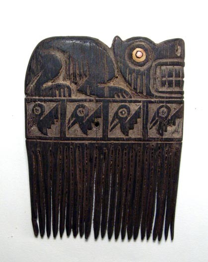 Attractive wooden Chancay comb, AD 1200-1450: An attractive wooden Chancay comb, c. AD 1,200 – 1,450, the handle decorated with a large canine with inlaid shell eyes, a row with four squares below, each containing a pelican. Both sides of the c
