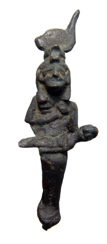Egypt Bronze figure of Isis and the infant Horus: A seated bronze figure of the goddess Isis suckling the infant Horus, Late Period, c. 664 - 323 BC. She wear a headdress consisting of a solar disc with horns, her hand on her breast. L: 3 7/8" (10 cm