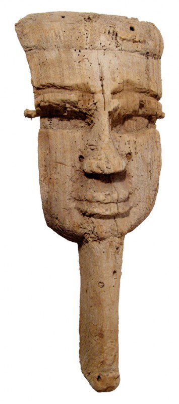 Egypt Large wooden mask from a sarcophagus: A large wooden mask from a sarcophagus, Late Period, c. 664 - 323 BC, with partial headdress and false beard. Some losses to either side and weathering. Wire mounted on back to hand from a wall. H: 19