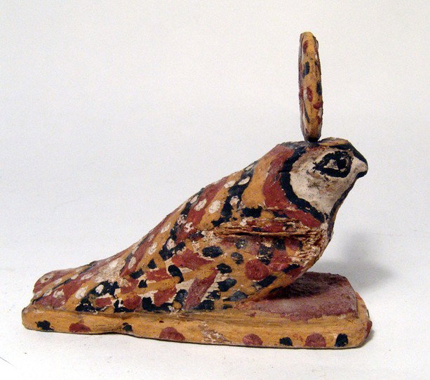 Egypt Well preserved polychrome wood Horus falcon: A well preserved polychrome wooden Horus falcon, Late Period, c. 664 - 30 BC, wearing a solar disc on its head. Intact with the original paint still brilliantly preserved. L: 4 1/8" (10.5 cm); H: 3 1/