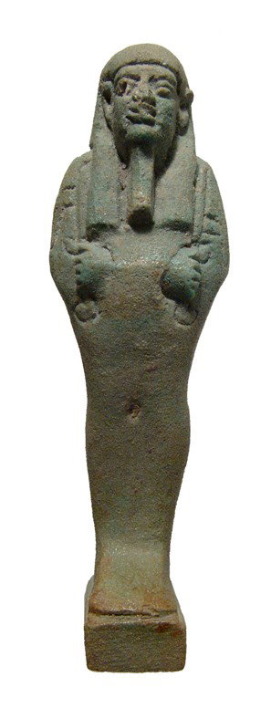 Egypt Attractive blue-green faience ushabti: An attractive blue-green faience ushabti, Late Period, c. 664 - 30 BC, with extremely well modeled features. The face is handsomely rendered framed by a tripartite wig and wearing a false beard. The h