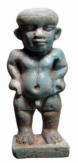 Egypt Large two-faced faience amulet of Pataikos: A large two-faced faience amulet of Pataikos, Late Period, c. 664 - 30 BC, with fine style and crisp detail. The chubby dwarf protector god is depicted nude, hands at his side, his face on both the fr