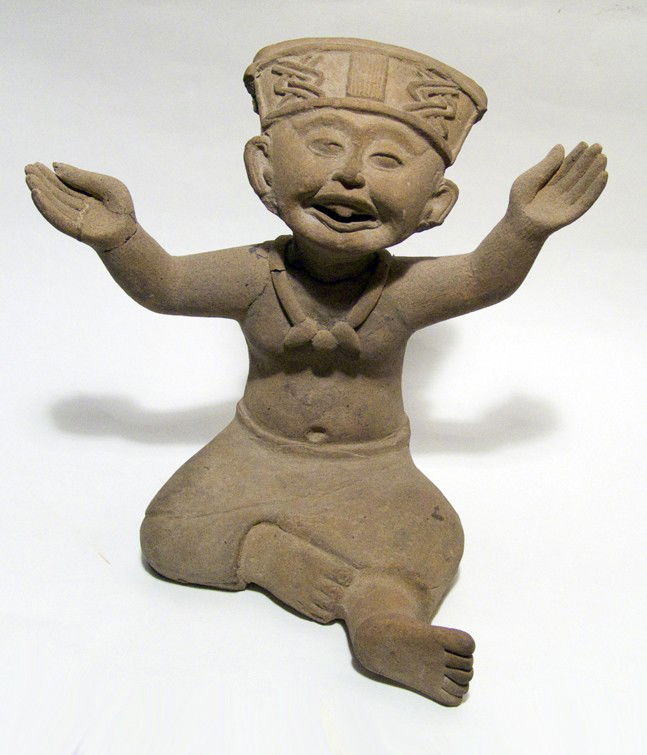 A nice seated Vera Cruz male figure: A nice seated Vera Cruz male figure with outstretched arms, ca. 300 - 100 BC, his expression one of joy. His mouth is open and he seems to be enjoying some sort of revelry and wears a detailed headdre