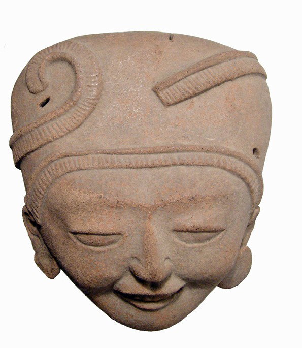 A large hollow terracotta Vera Cruz head: A large hollow terracotta Vera Cruz head, ca. AD 550 - 950, with smiling expression and decorated headdress. H: 5 1/2" (13.8 cm). Ex old Los Angeles collection.