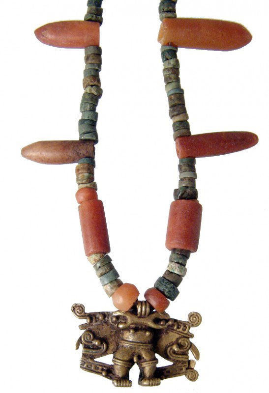 Tairona bead necklace with tumbaga figure: A nice Tairona bead necklace with intricate tumbaga figure, Colombia, ca. 1000 - 1500. The tumbaga is in the form of deity with much style and detail, W: 1 1/2" (3.8 cm). The necklace is comprised of 